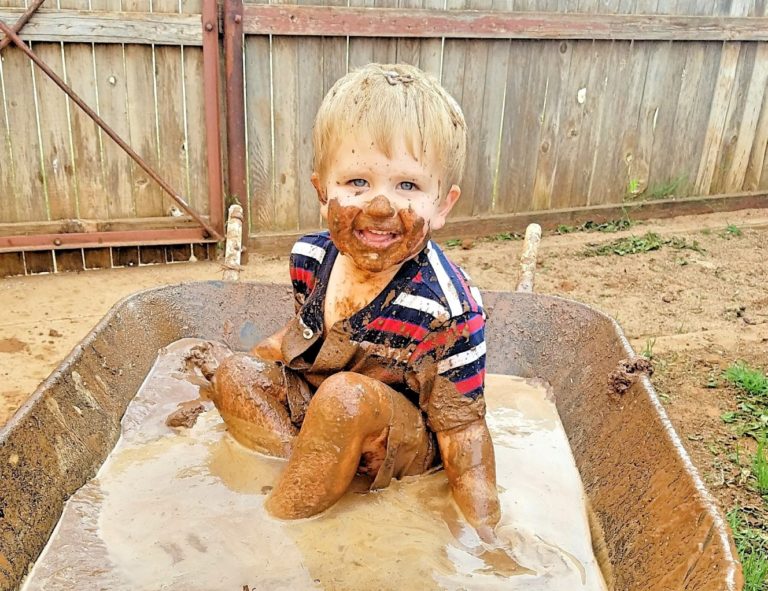little boy playing in the mud www.herviewfromhome.com