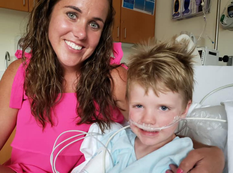 Child and his mother in hospital smiling in photo