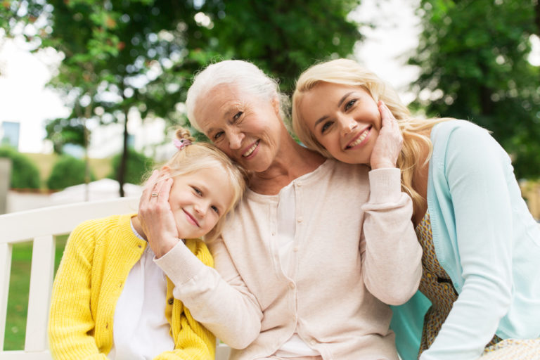 Older woman with younger mom and daughter