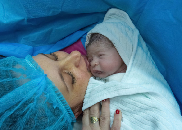 Mom with newborn baby c-section