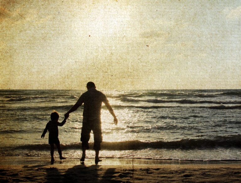 Father and son outside silhouette