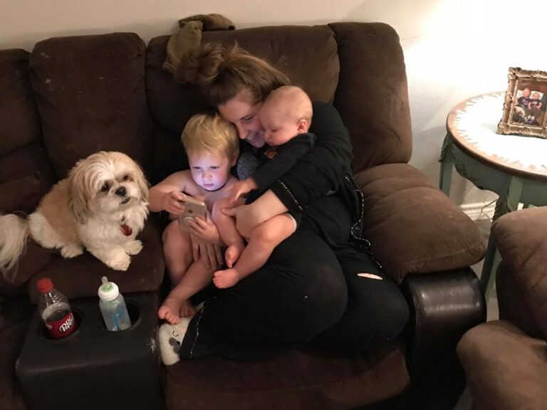 Mother with toddlers and dog