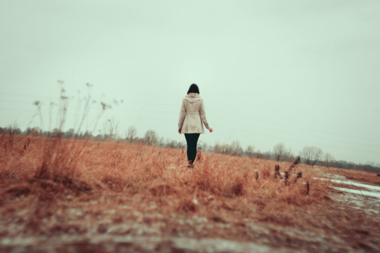 Woman walking in field