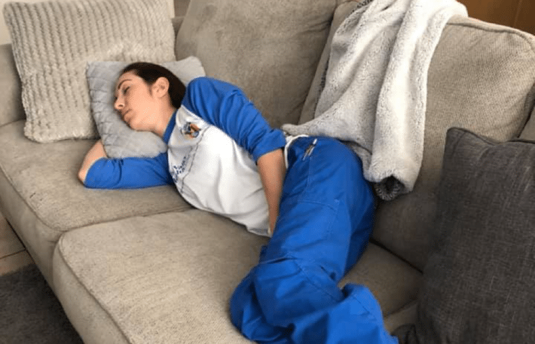 Nurse napping on couch