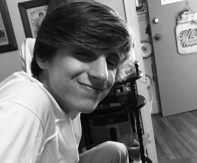 Teenage boy, black-and-white photo
