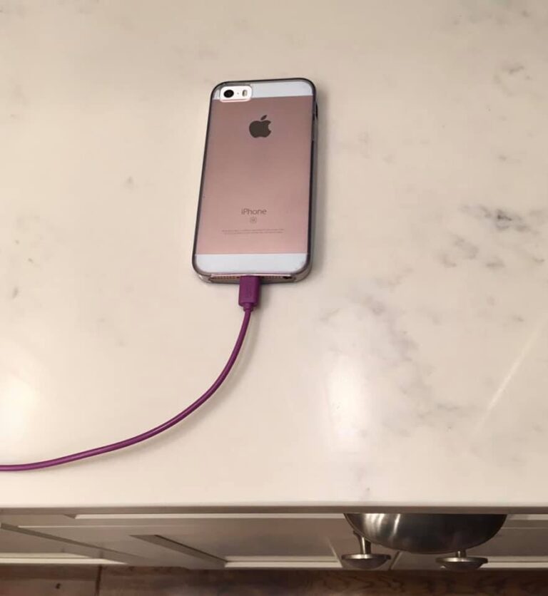Phone charging on countertop