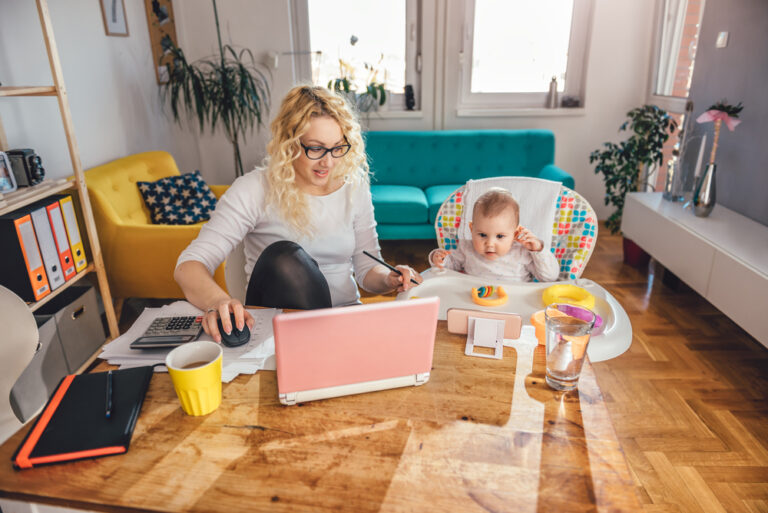 Mom working from home with baby