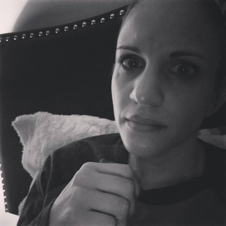 Black and white selfie of sad woman