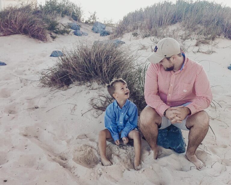 Dad and son on beach