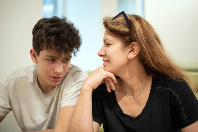 Teen and mother talking