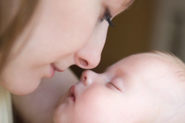 Mom and baby touching noses