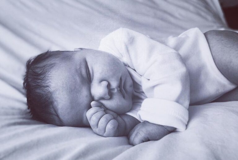 Newborn baby, black and white photo