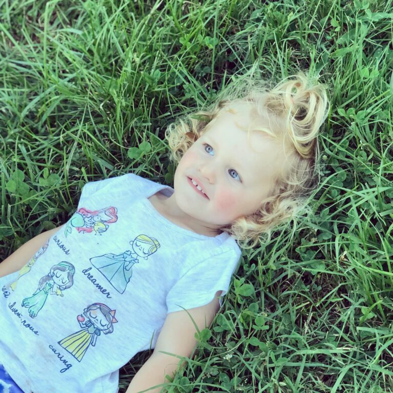 Little girl in grass