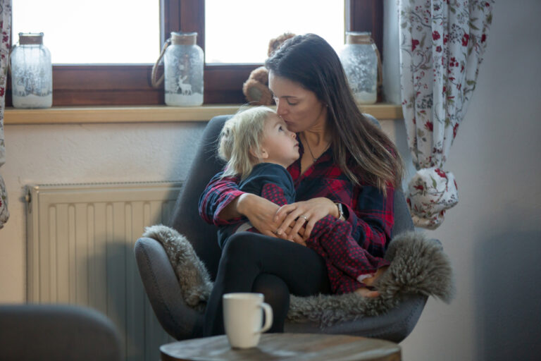 Mom sitting with toddler at home