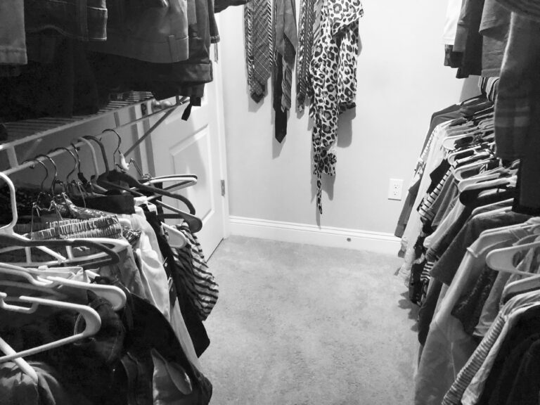 Inside of a closet, black-and-white photo