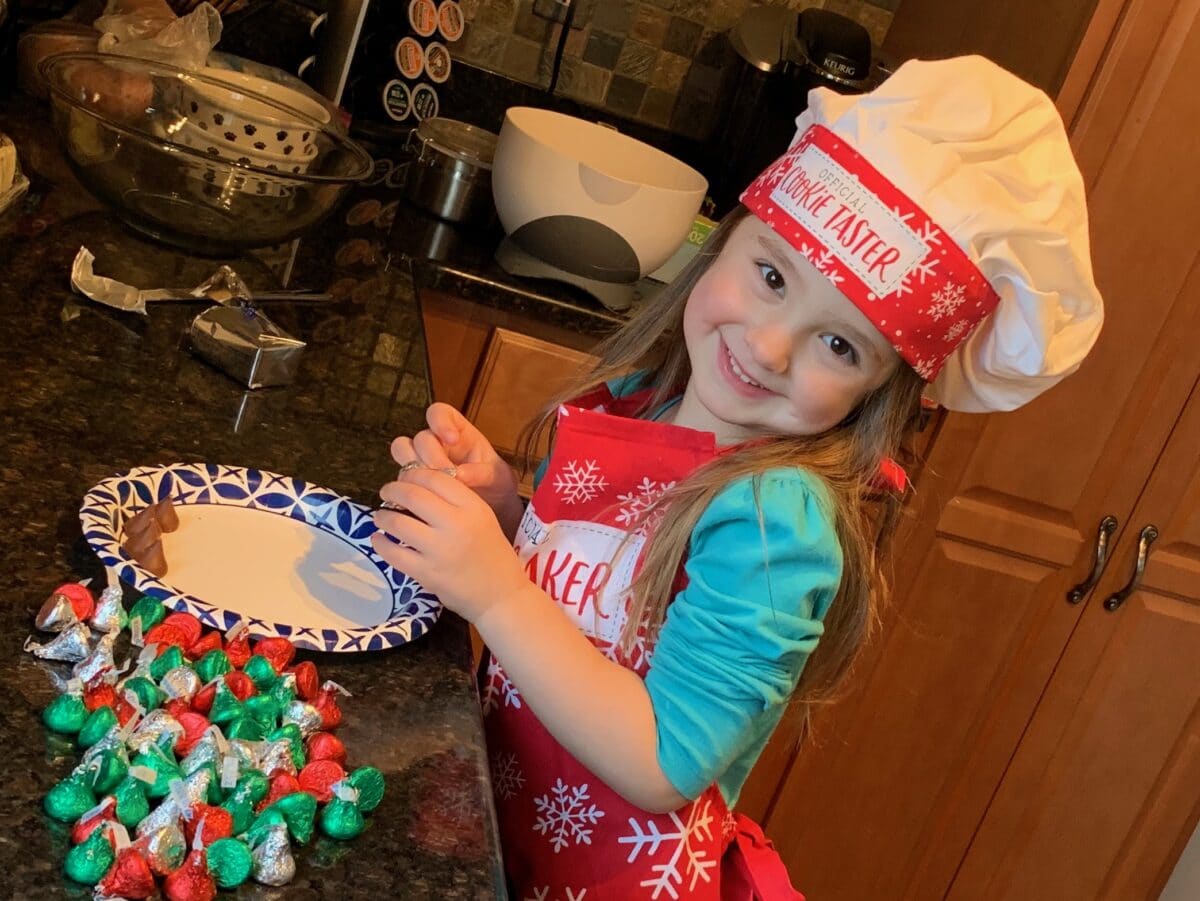 little girl baking cookies