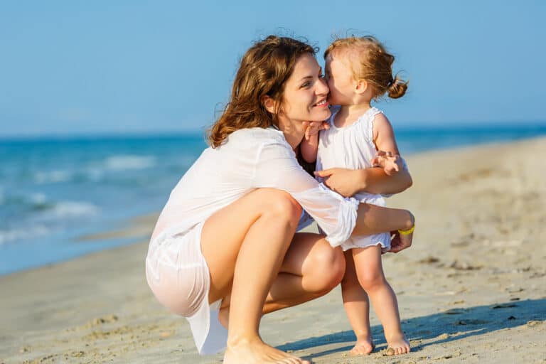 Mother and daughter on beach
