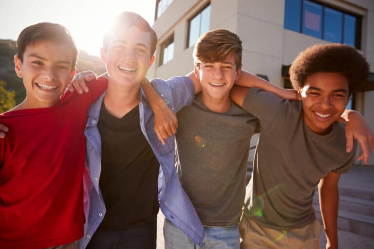 Teen boys smiling