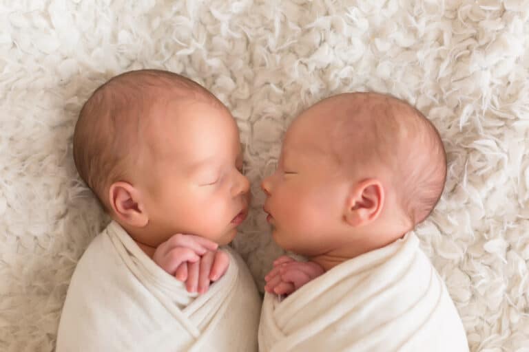 Newborn twins asleep