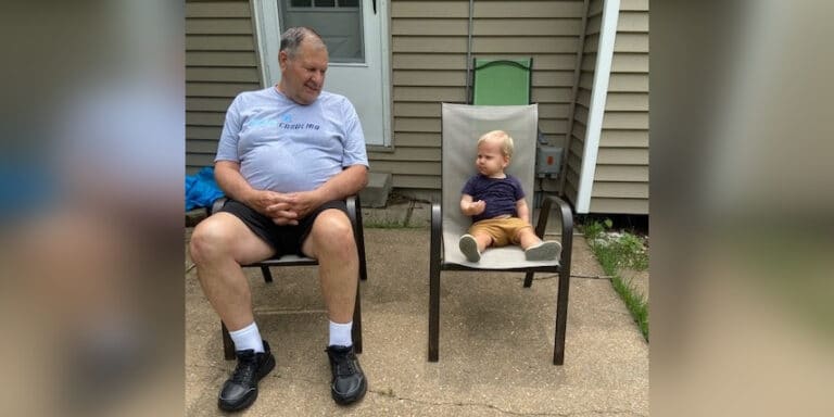 Grandpa and grandson on chairs