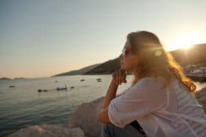Woman looking out at water
