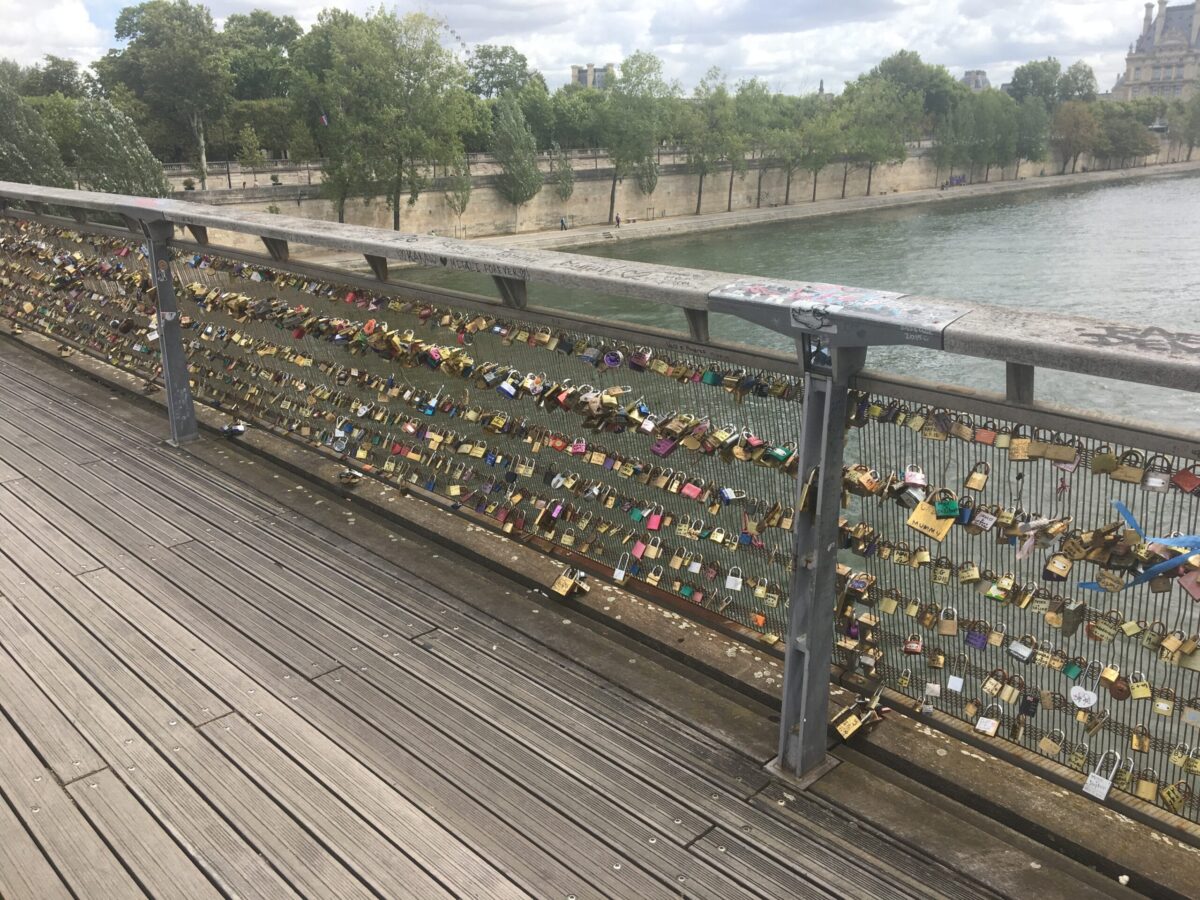 Bridge full of small locks, color photo