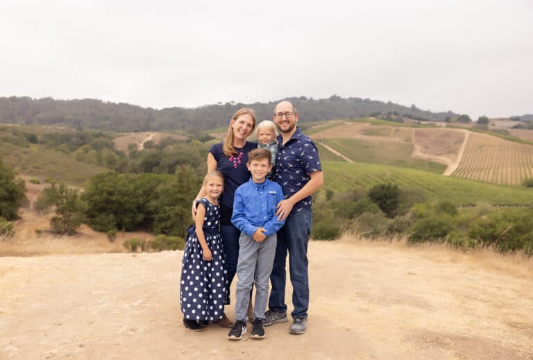 Husband, wife, three children, color photo