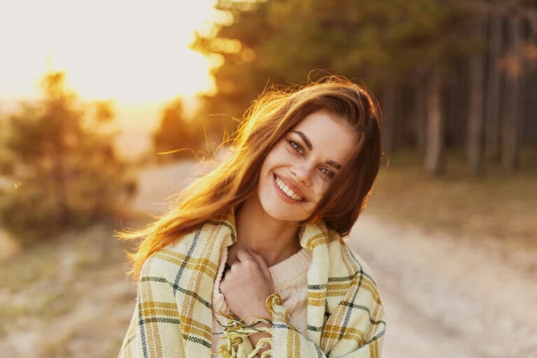 Smiling woman in sun