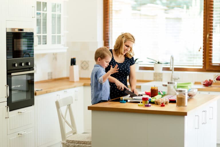 Mother and son in kitchen