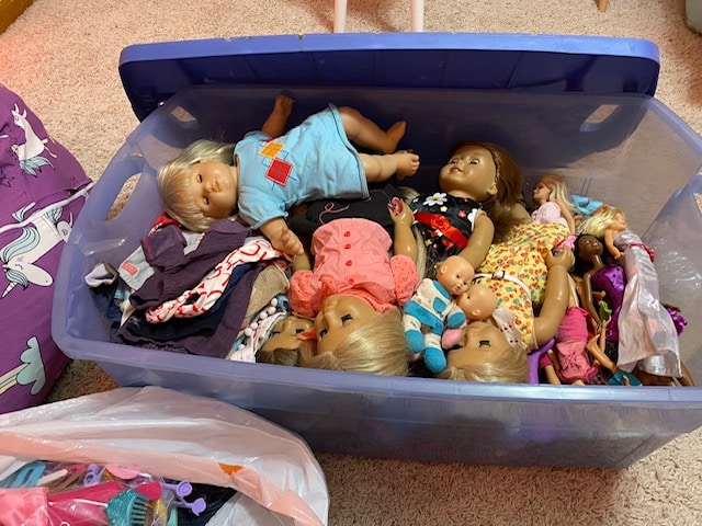 Tub full of dolls, color photo