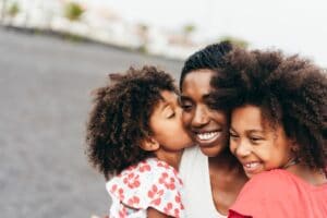 Black mom with daughters