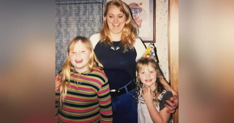 Mother and two daughters, older color photo