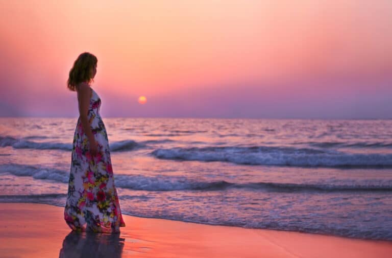 Woman at beach sunset