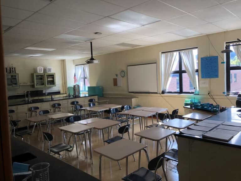 Classroom of empty desks, color photo