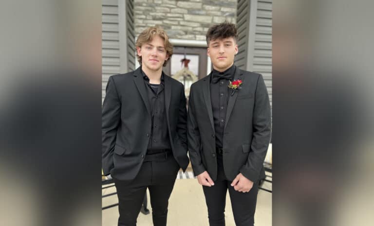 Two teen boys dressed in suits, color photo