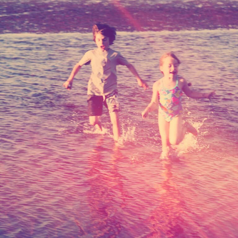 Kids playing in water vintage photo