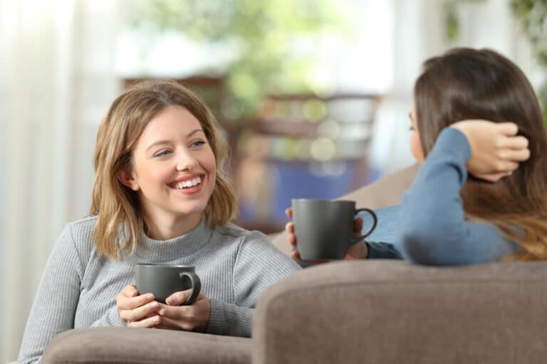 Two women having coffee at home