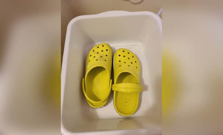 a pair of yellow crocs