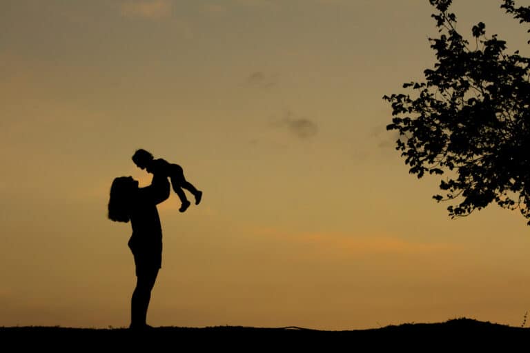 Mom with child silhouette
