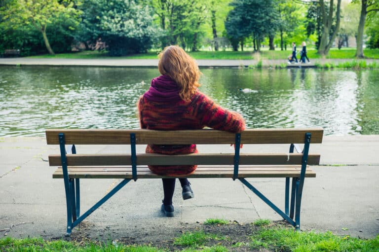 Woman alone on bench