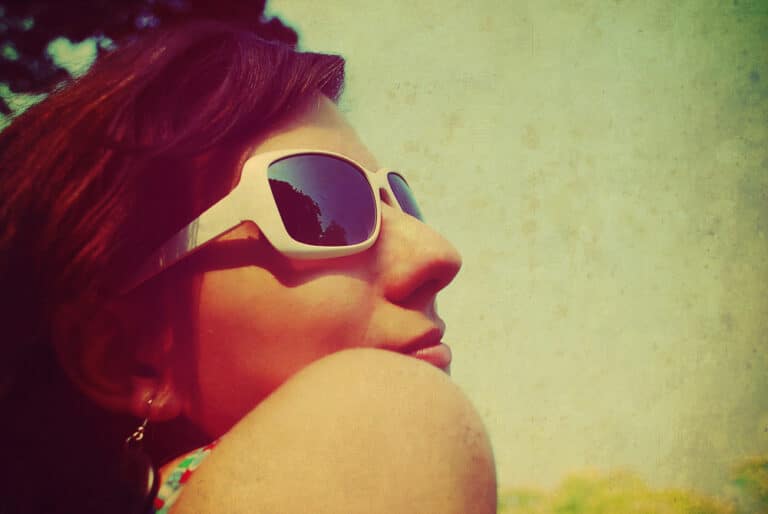 Retro photo of woman in sunglasses