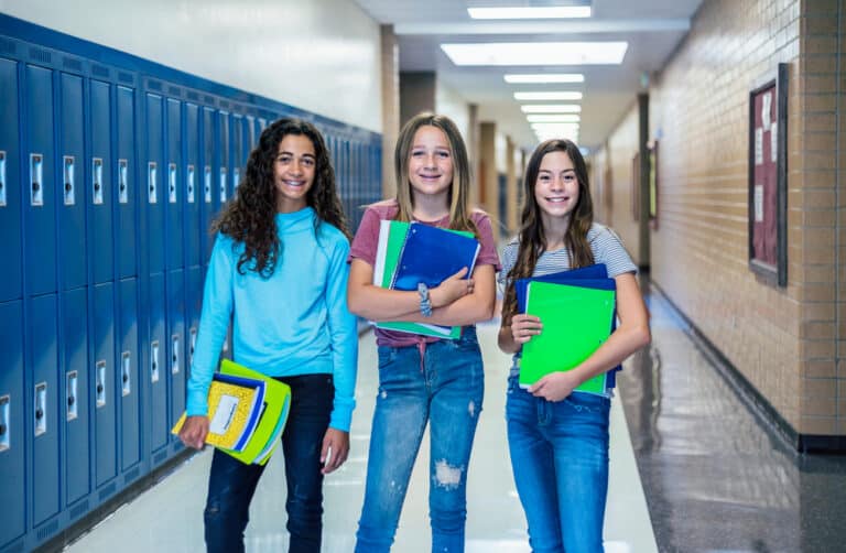 Middle school girls in hallway
