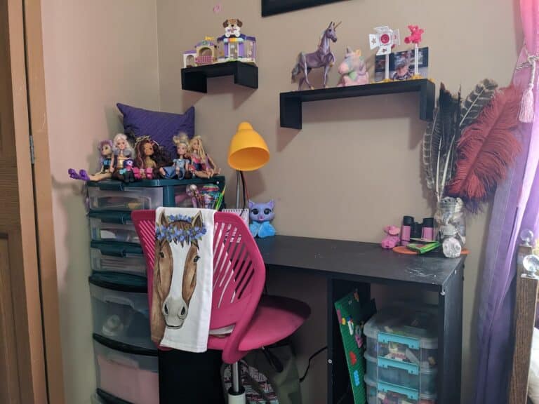Girls desk in bedroom, color photo