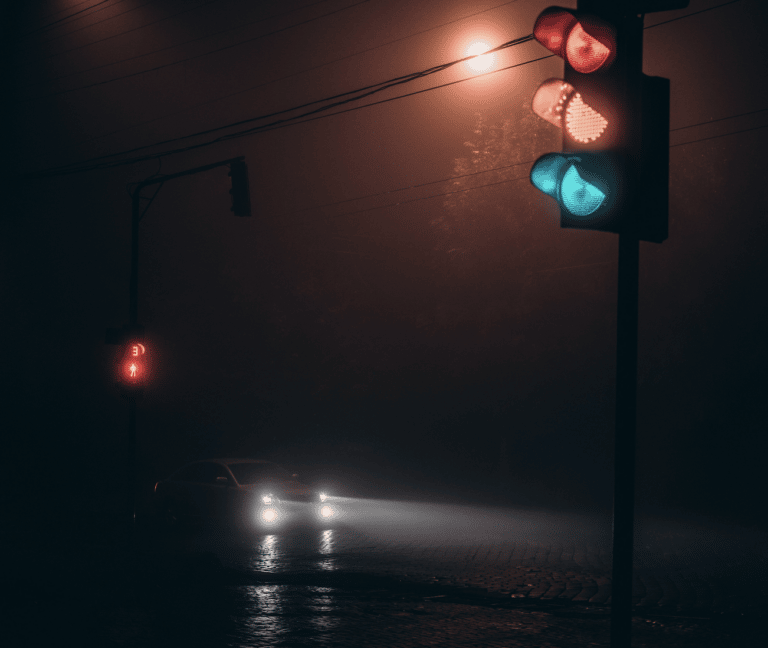 Traffic signal on a rainy night, color photo