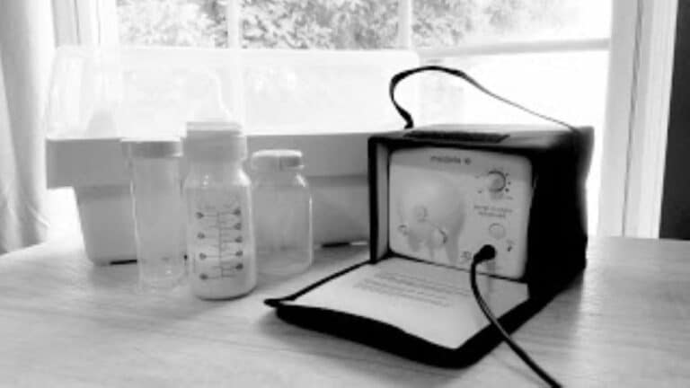 Breast pump with bottles, black-and-white photo