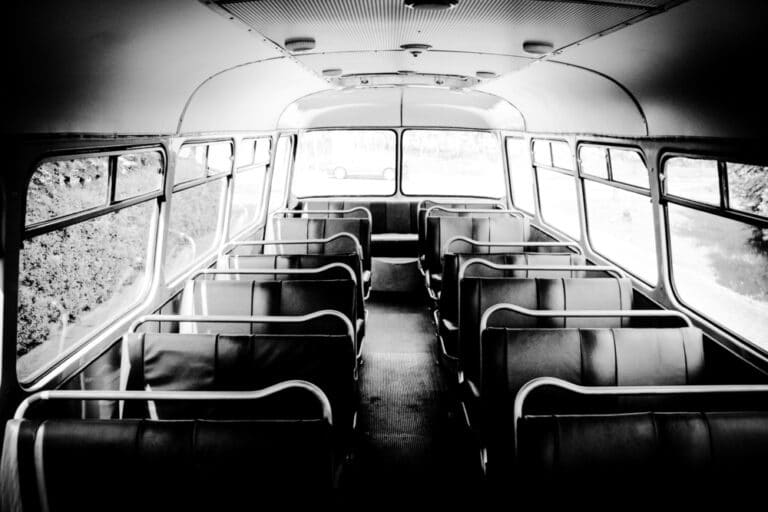 Old bus interior, black and white photo