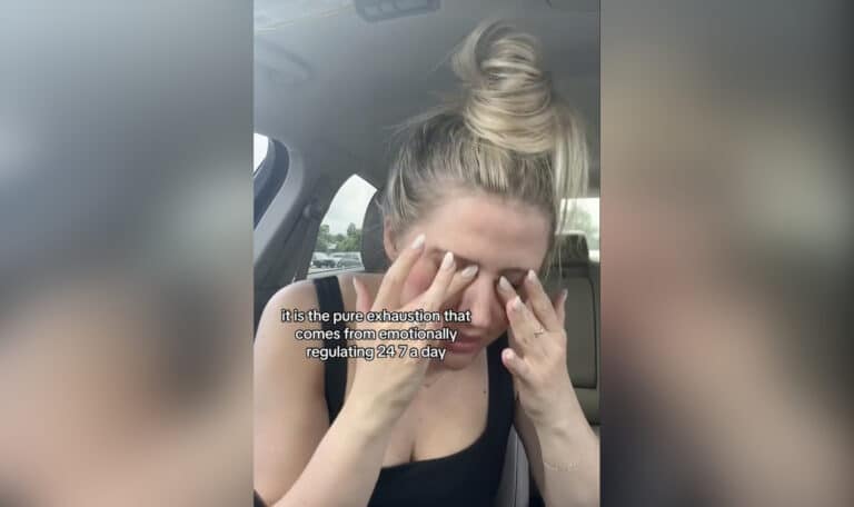 Annalee Grace video on TikTok, mom with bun covering her eyes in front seat of car