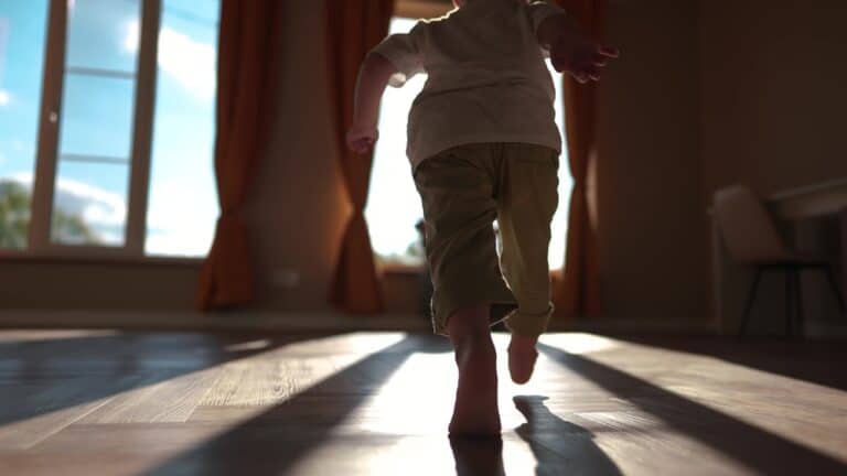Child running into sunlight