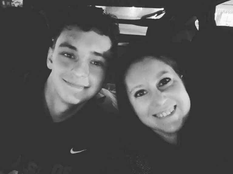 black and white photo of a mom and son