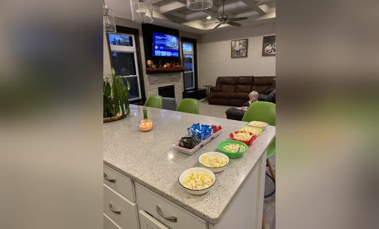 Kitchen island with bowls of snacks, color photo